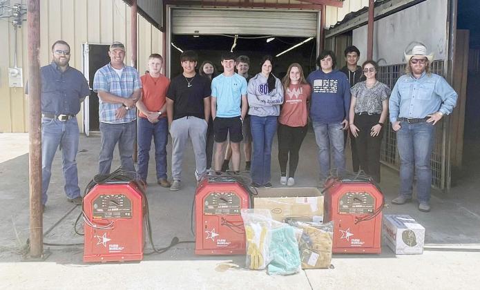 MHS Ag science/FFA department graciously accepted 3 new welders plus supplies, made possible by Menard County Farm Bureau. “I know the kids will be so excited to use them,” said Ag teacher Brittyn Walker. Farm Bureau representatives pictured above are, far left- Zach Nash and Tyson Roll; far right Cody Swindall.