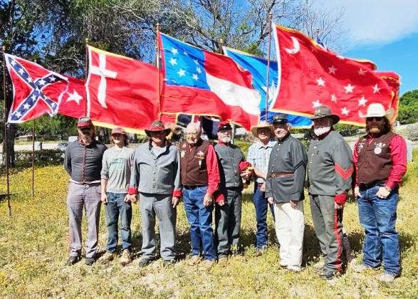 The local Sons of Confederate Veterans (SCV) Camp 2326 recently honored Confederate soldiers laid to rest at Pioneer Rest Cemetery, as well as across Menard County. Pictured after the ceremony is, left to right- Wayne Carlile, Will Masters, Danny Masters, John Kniffen, Gary Bates, Bill Adcock, Terry Kelley, Barry Kniffen, Cody Swindall.
