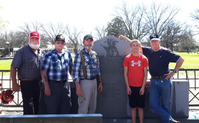 Members of Menard's Sons of Confederate Veterans (SCV) Camp 2326 cleaned the monuments at Veterans Park on March 13. Cleaning was accomplished using DS2, a biological cleaner also used by the U.S. Department of Veterans Affairs. Pictured left to right are Barry Kniffen, Eddie Bostwick, Gary Bates and grandson Seth Bates, Terry Kelley. Courtesy photo.