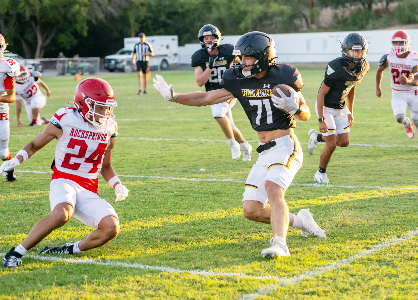 JUNIOR WESLEY COMPTON deflects a Rocksprings defender during the Angora’s scrimmage in Menard last week, while Ashton Martin and Julius Zamora look on. The Jackets’ first game is this Thursday, 8/27 here at home against Bronte at 7:30. Nora Davis, photo.