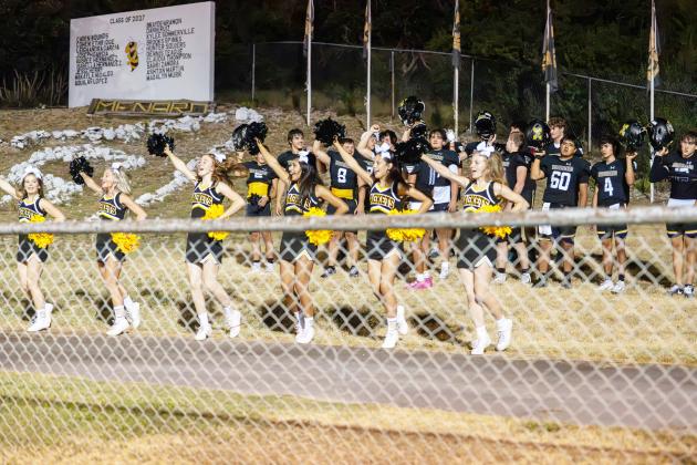After last week’s win over Bronte, the football team, cheerleaders and band rushed Victory Hill on the west side of Findlay Field to celebrate as the band played the fight song. Nora Davis, photo. See additional photos on page 7.