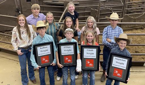 Future Ag producers from Menard participating in the Hill Country Youth Commercial Heifer Show pictured front row (l to r): Kallan Wright, O’Dan Wright, Linah Wright, Gus Wright. Middle row: Makenzie Wright, Caitlyn Burch, Channing Chambless, Taytum Chambless, Roy Mews. Back row: Benjamin Burch and Daphne Mews. Each contestant was provided with a new pen sign featuring their name and county by Menard County Farm Bureau, pictured above. Courtesy Photo.