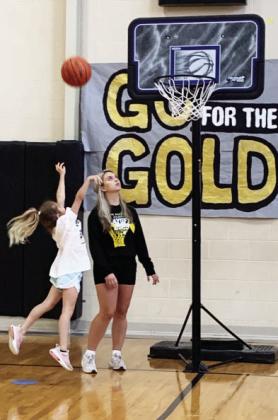 snagged this shot of a young basketball camper shooting under the watchful eye of MISD coach Kirsten Allen.  The camps, which started Monday, catered to boys and girls up to 8th grade, and concluded on Wednesday.