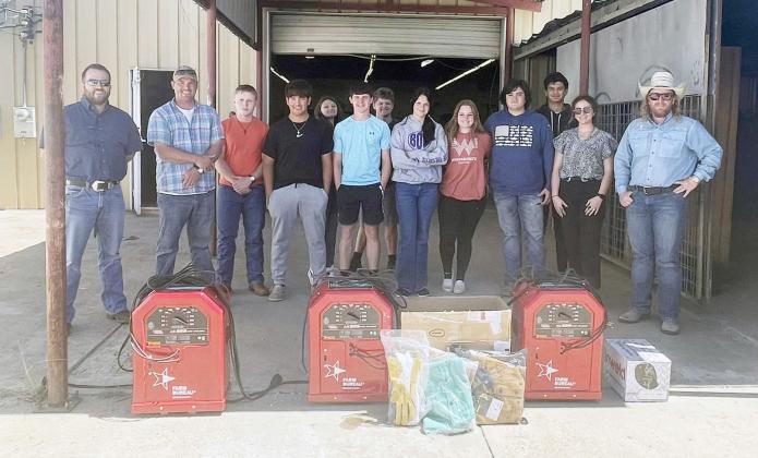 MHS Ag science/FFA department graciously accepted 3 new welders plus supplies, made possible by Menard County Farm Bureau. “I know the kids will be so excited to use them,” said Ag teacher Brittyn Walker. Farm Bureau representatives pictured above are, far left- Zach Nash and Tyson Roll; far right Cody Swindall.