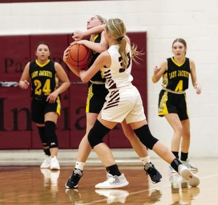 Freshman Lady Jacket Taytum Chambless works to avoid decapitation from a Paint Rock player in Menard’s 99-7 stomping of Paint Rock in a late district game. Perla Pecina and Kaitlyn Whitaker are in the background. Unfortunately for the Lady Js, they ended up on the losing side of their bidistrict matchup against Water Valley. Nora Davis, photo.