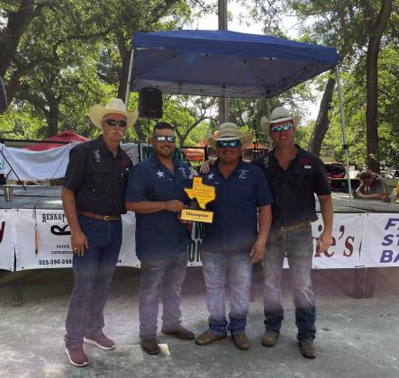 THE CHAMPS- The Smokin' Borrachos of Menard are the overall grand champion cookers in the Jim Bowie Day Cookoff. The team racked up second place brisket, second place ribs, and third place chicken. Pictured left to right: Lee Thornhill, Chamber director; Isaac Saiz; Guillermo 'Mamo' Castenuela; Clint Roberson, Chamber director. MCCC photo.