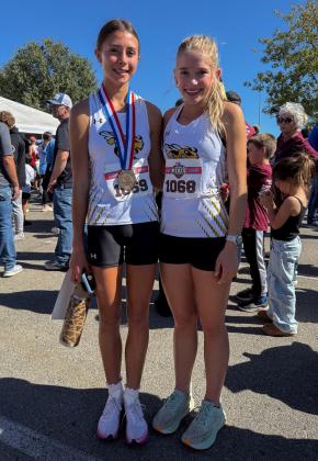 ALL SMILES from Danni Ruiz and Taytum Chambless after their respective 3rd and 29th placings at the state track meet last Friday. Courtesy photo.