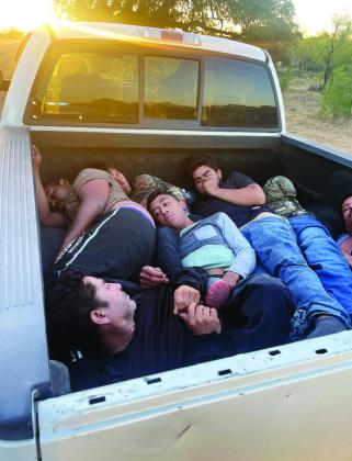 TEN OF THE 11 ILLEGAL IMMIGRANTS in a pickup driven by a U.S. citizen west of Menard were detained after a traffic stop resulted in the driver and front passenger being arrested on 11 counts of human smuggling. MCSO photo.