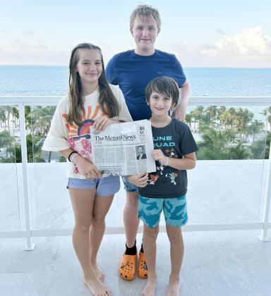 The Corbin family enjoyed the latest Menard News during their Cancun vacation last week. Claire, Cade, and George (pictured) and their parents Valera and Brandon were able to safely conclude their trip as scheduled, just missing Hurricane Beryl as she came roaring through the region.