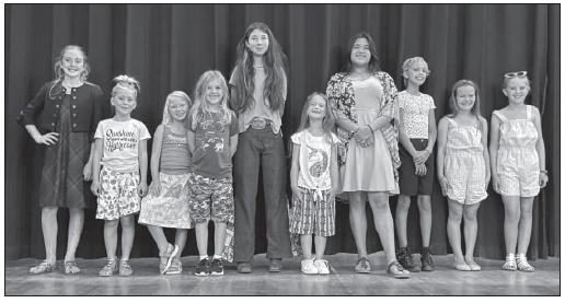 SEW WHAT’S THIS ALL ABOUT- Youth 4-H sewing project participants recently walked the stage in their homemade duds. Pictured, left to right, is Mackenzie Wright, Linah Jo Wright, Daphne Mews, Madison Sloan, Mia Estrada, Kylie Smith, Izzy Morales, Londyn Duderstadt, Claire Corbin, Caitlin Burch. Courtesy photo.