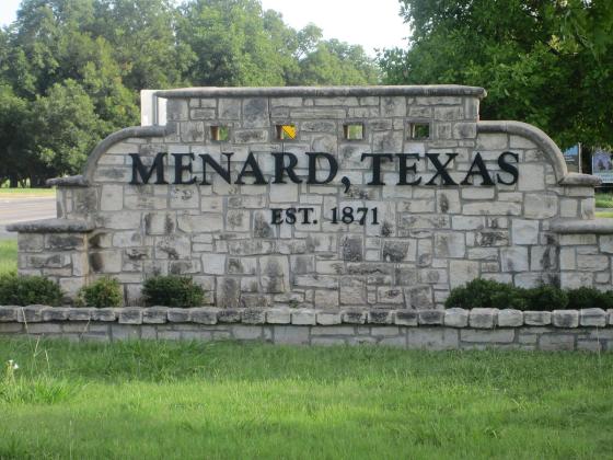 Rock sign reading Menard, Texas Est. 1871