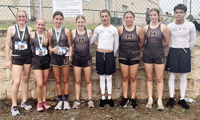 BELOW MHS cross country teams at Harper.