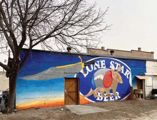 AND BOB WILLS MUSIC- Comes to mind when seeing the vibrant new mural painted on the west side of Johnson's Free State downtown. The building, located at 114 W. San Saba Avenue was formerly the Lone Star Beer distributorship. TMN photo