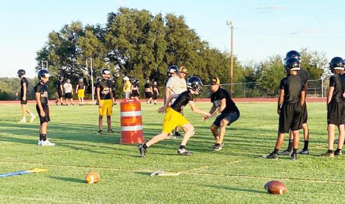ABOVE- Yellowjackets and their coaches are putting in the work as official U.I.L. practices commence this week. Courtesy photo.