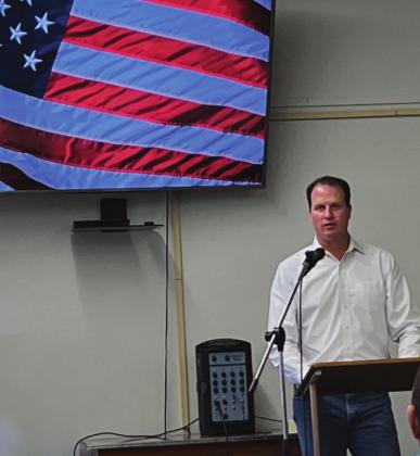 ABOVE- U.S. District 11 Representative August Pfl uger speaks with citizens of Menard during Pfl uger’s Town Hall meeting on Monday, January 17, 2022. In the meeting, Plfl uger reported what he has been working on in D.C., and took the time to answer all attendee questions. TMN photo.