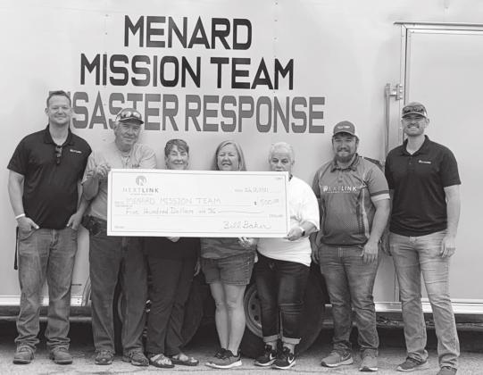 LEFT- Local NextLink representatives present a donation to the Menard Mission Team. Pictured are, left to right: Jason Brown (NextLink), Steve Whitson, Bride Roberts, Darla Pollard, Louise Whitson (all of the Mission Team), Cooper Tipton, Chris Huffman, both with NextLink. TMN photo.