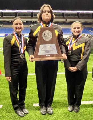 ADD A SILVER TO THE TROPHY CASE- Yellowjacket marching band drum majors Lorelei White, Tristan Wilson, and Kailey Morris proudly display their silver medals and plaque from the UIL State Marching Band Championships on Tuesday. TMN photo.