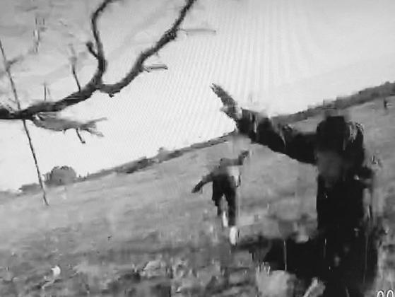ABOVE- this still from a Menard County Deputy’s body cam captures the image of two individuals fleeing law enforcement during a recent bailout. MCSO photo.