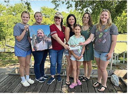 BEAUTIFICATION OF MENARD (BOM) board members received a $500 donation from the Houston Simmons Memorial Endowment Fund. Pictured (l to r) are the late Houston Simmon's niece Riley Abernathy, his three sisters Nikki Keegan, Katie Parker, Hannah Beall; niece Winnie Beall; BOM President Sarah Thigpen; BOM Secretary Jamie Hough. Read more about the organizations and donations on page 2. Courtesy Photo.