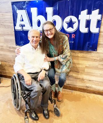The Honorable Greg Abbott and Beverly Malcolm.