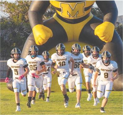 READY TO RUIN THE EAGLES' DAY are the varsity Menard Yellowjackets on the road in Leakey last week. Menard triple-swept Leakey, defeating their Junior High, JV, and varsity last Thursday afternoon. Pictured left to right- Kade Rayburn, Jadon Torres, Tucker Pullen, John Michael Eggleston, Brandon Spinks, Aidan Ramon, Wyatt Terrell, Hunter Whitaker. Nora Davis, photo.