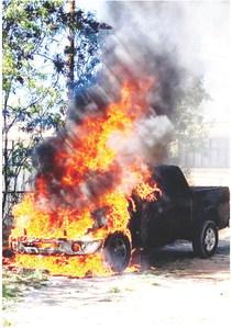 HOT STUFF- A dark gray Ford F150 pickup was a total loss after it was engulfed in flames shortly after being parked last week. The fire was quickly extinguished and there were no injuries. Photo Courtesy Menard County S.O.