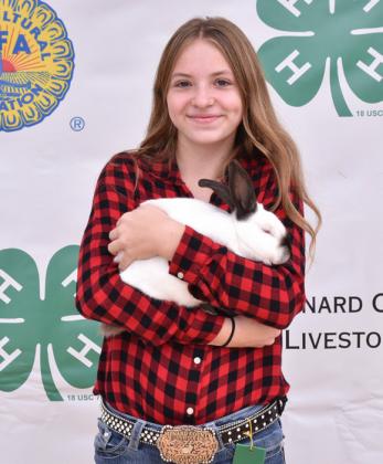 Isabelle Devine with her 6th place Junior Buck. Photo by Madolyn Nasworthy.
