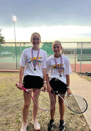Makenzie Wright (l) and Taytum Chambless won 1st place in girls doubles at the district meet. Nora Davis Photo.