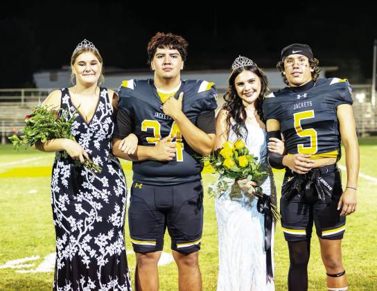 HOMECOMING ROYALTY- Newly crowned Band Sweetheart Kylee Sommerville, left, with her escort Joseph Garcia, stand alongside the new Football Queen, Sabri Zamora, with Marlee Salas after the ceremony following the Jackets’ 78-0 homecoming win over Paint Rock. See more on the homecoming court on pages 9 and 10. Nora Davis, photo.
