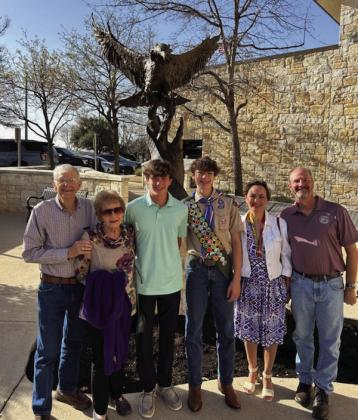 PROUD OF THEIR EAGLE SCOUT- left to right: Bill and Jo Ann Royal, Nicholas and Jake Royal, Annette and Greg Royal together after Jake accepted in Eagle Scout pin and sash. Courtesy photo.