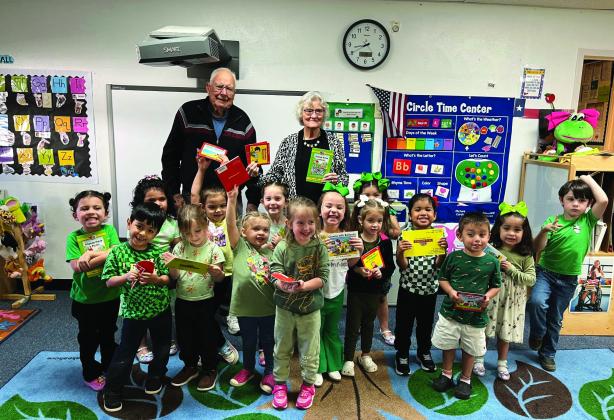 John and Katherine Kniffen presented books to each the young Menard students. The books were provided by Menard-Kimble-Mason Retired Teacher Association.