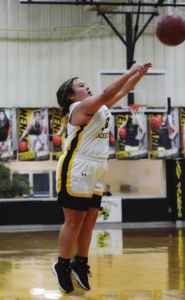 ABOVE- Menard’s Amber Ibarra sinks a 3-pointer against Paint Rock on Friday, January 14.