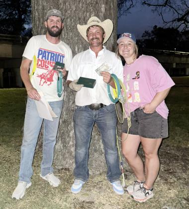 HOCO Benefit Goat Roping Champions Wade Johns and Ty Titzman with Ag Sciences teacher Macie Smith.