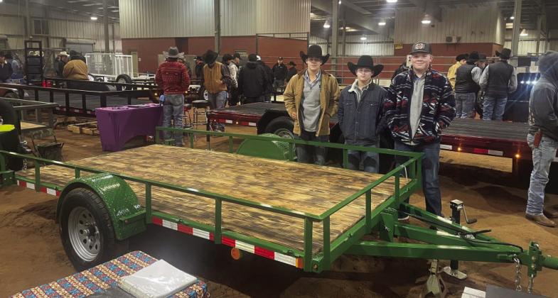 BLUE RIBBON WINNERS- Senior Jay Guerrero, junior Kade Rayburn, and freshman Tate Wagner earned a blue ribbon- the highest honor given at the San Angelo Ag Mechanics contest- for their 15 foot utility trailer made for the Menard Public Library’s Party at the Presidio auction. Courtesy photo.