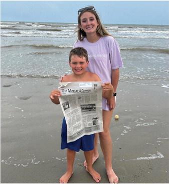 Abraham Hill and Ayden Matlock enjoyed The Menard News at Cinnamon Shore in Port Aransas, Texas. Where will it go next? Courtesy Photo.
