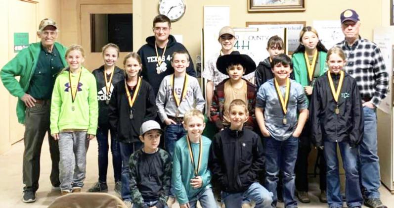 Participants in the 2022 Menard County 4H BB Gun Championship Match: L-R, Front Row: Noah Manrique; O’Dan Wright, Logan Kunamoto. Second Row: Caitlyn Burch; Channing Chambless, Kallan Wright, Ian Brown; Trevor Mazac, Taytum Chambless. Third Row: Coach David Hand; Isabelle Devine; Larkin Loeffler; Wesley Compton; Danni Ruiz; Mia Estrada; and Coach Terry Kelley. Courtesy photo.