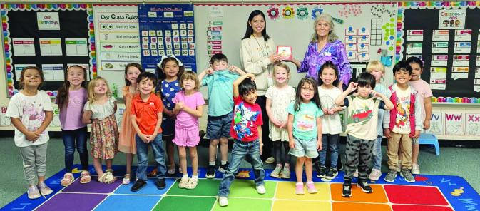 TRTA presents books to Menard Pre-K students