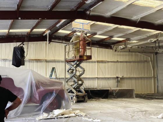 NO MO' SNOW- The old, falling (snowing) fiber insulation at MVFD station has been replaced with efficient and clean spray foam insulation. The VFD will hold their annual BBQ fundraiser this Saturday, and invites the community to see the much-needed upgrades their donations have funded. Courtesy photo.