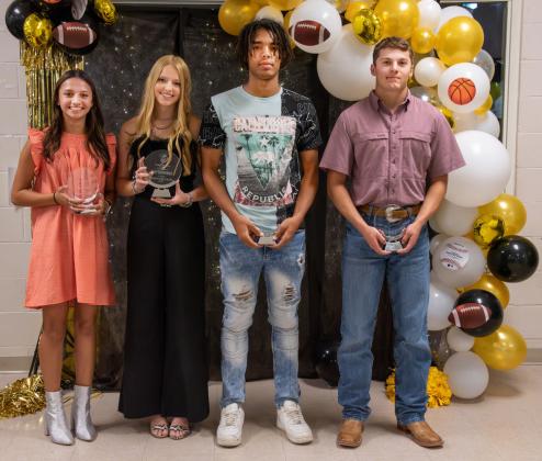 TOP BANQUET HONORS went to (left to right): Hailey Ruiz, Fighting Heart Award female; Addy Bannowsky, Athlete of the Year female; Isaiah Stanislawski, Athlete of the year male; Joel Guerrero, Fighting Heart male. Nora Davis, photo.