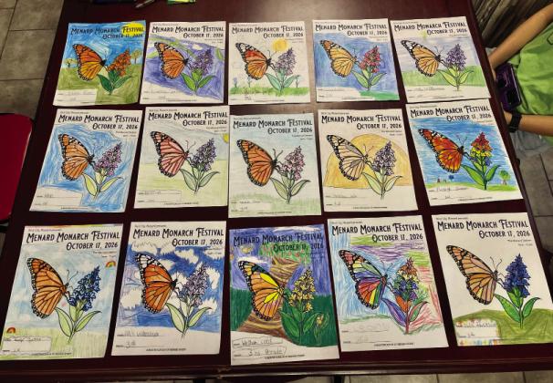 Check out the Menard Monarch Festival Coloring Contest entries on display at the post office. Courtesy Photo.