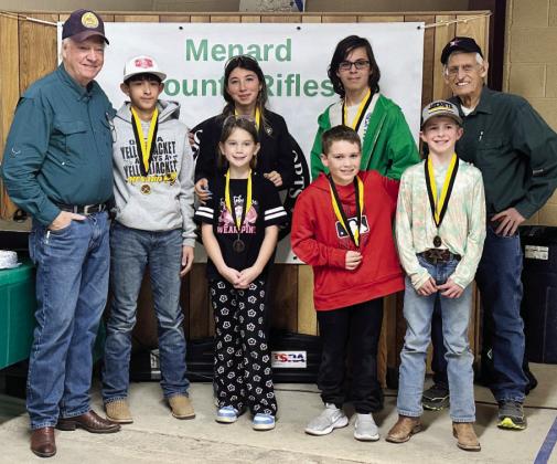 BELOW- Menard 4-H Rifles Coach Terrell Kelley, Mason Mireles, Kylie Smith, Mia Estrada, Abraham Hill, Jackson Thigpen, Gus Wright, Coach David Hand. Courtesy photo.