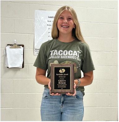 Cristy Burch was announced as this year’s PTO Spotlight Award winner. Caitlyn Burch happily accepted the award on behalf of her mom, who was unable to attend the meeting. Courtesy Photo.