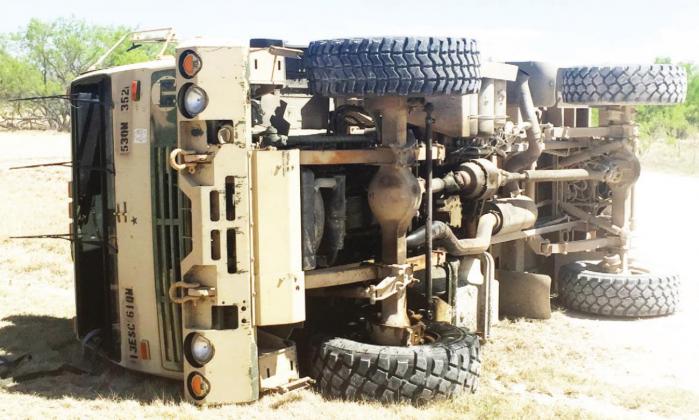 Tactical truck tips over