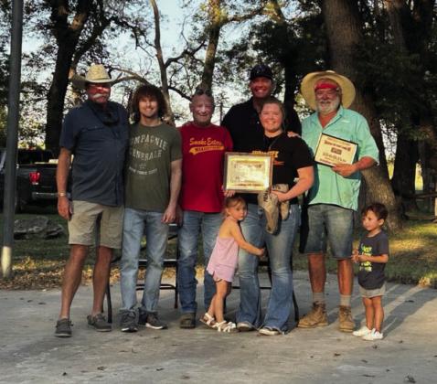 The Hough Brothers team won 1st place in the Bloody Mary and Mystery Dish competitions. They also brought home 2nd in Poppers, Hot Wings, and 3rd in Chili. Pictured (l to r) - Bruce Hough, Jessup Hough, Curley Wagoner, Joe Hough, Jamie Hough with Emily Flores hugging her leg, Tommy Hough, and Caleb Flores. Courtesy Photo.