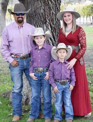 NEW TO THE CHAMBER BUT NOT NEW TO MENARD- Kyra Ramon, a Menard native, recently joined the Chamber office as a part-time assistant. Pictured are Kyra’s husband Michael, and their boys Brayden and Camden.