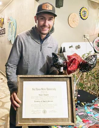 MENARD NATIVE Logan Rogers proudly displays his hardearned bachelor of Applied Science degree from Sul Ross State, completed in December. Courtesy photo.