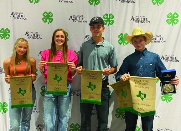TEXTILE TEAM (l to r) Taytum Chambless, Makenzie Wright, Cado Bannowsky, and Kade Bannowsky made up the Menard 4-H Wool and Mohair judging and team placed 2nd overall in Mohair contest and 4th overall in the Wool at state roundup. The team qualified to advance to the National Wool Judging Contest in October. Courtesy Photo.