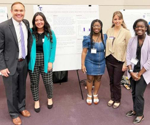 Dr. James Hurley, 16th President of Tarleton State; Rebecca De Los Santos, student researcher; Simone Dickson, student researcher; Dr. Jamie Borchardt, professor and faculty mentor; Bea Yousey, student researcher. Courtesy photo.