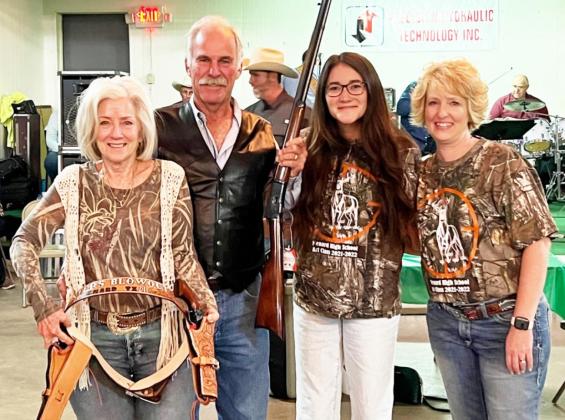 The winners of the special raffle at the 2021 Hunters Blowout Ball were Menardians Donna and Walter McAllister, left. Also pictured are Callie McSherry and Cherry Swindall with the Menard County Chamber of Commerce. The McAllister’s prize package included 2 Cimmaron P Model revolvers, 1 Cimmaron 1892 Lever-Action and a handmade full-rig leather holster made by Lance Hill of Menard’s Hill Leathercraft. TMN photo.