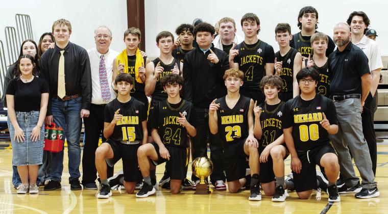 DIST. 12 REGION 2 BASKETBALL CHAMPIONS- Kneeling, left to right: Maddox Saiz, Julius Zamora, Marlee Salas, Brayden Ramon, Dario Gonzales. Managers, left: Kathryn Hebert, Lundann Jackson, Izabella Morales, Cade Corbin. Back row standing: Coach Jeffrey Campbell, Jaegar Leonard, Logan Powell, J.P. Payton, Jared Ruiz, Tate Wagner, Colby Powell, Eli Weatherly, Aidan Ramon, Mack Davis, coach Doug Weatherly, coach Conner Dawson. See story on page 8. Nora Davis, photo.